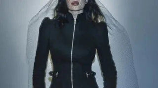 Best jean jacket styled with a dramatic net veil and sculpted fit for a high-fashion editorial look.